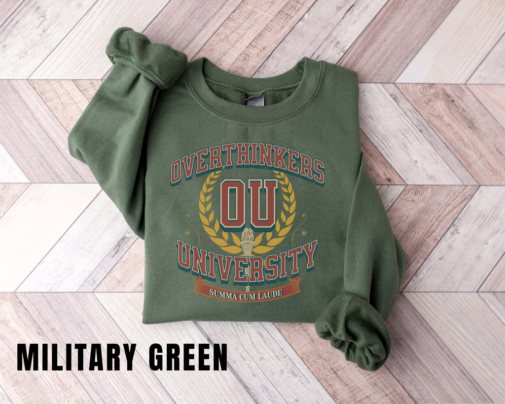 a green sweatshirt with the words military green on it
