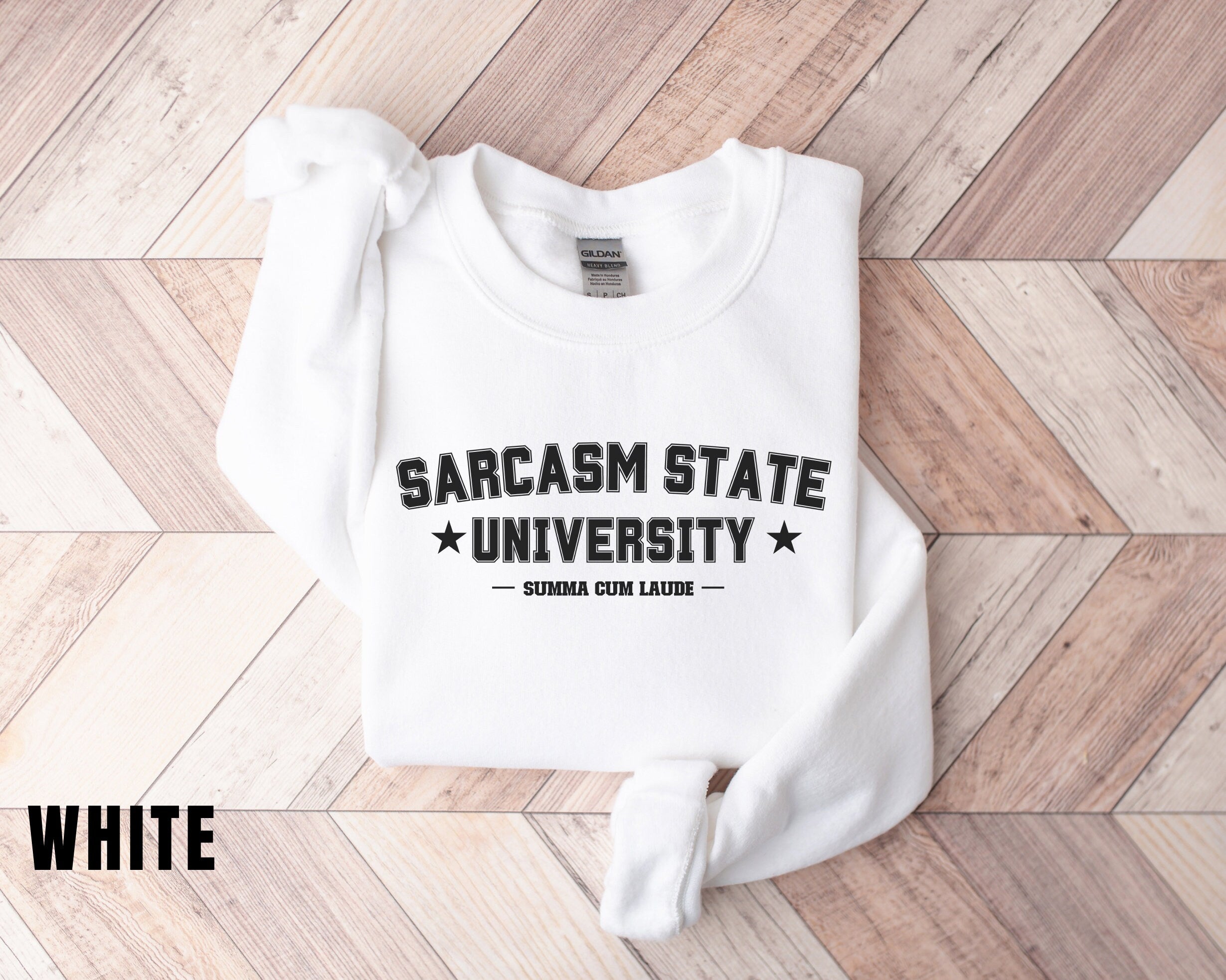 a white sweatshirt with the words sarcasm state university printed on it