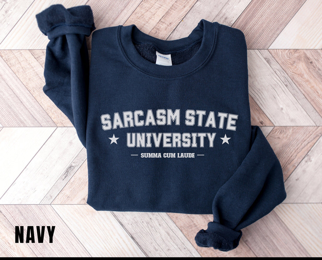 a blue sweatshirt with the words sarcasm state university on it