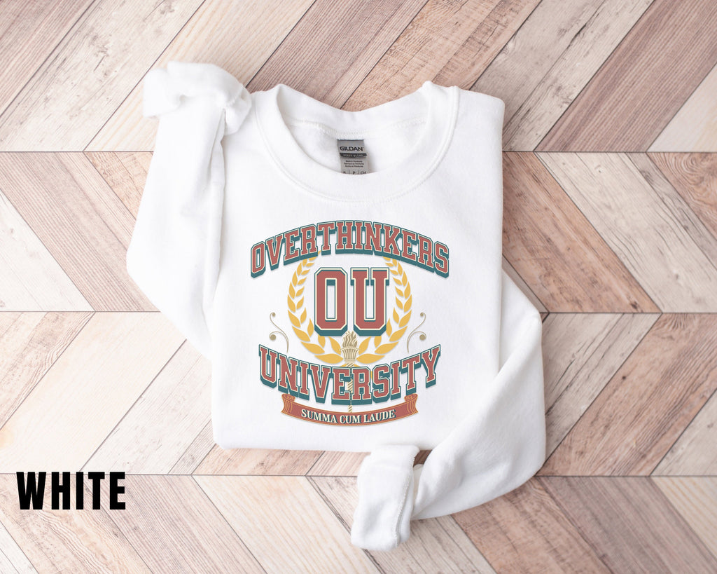 a white sweatshirt with the words university on it