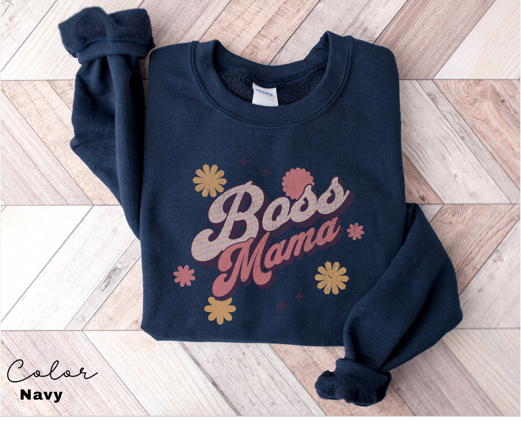 a blue sweatshirt with the words boss mama on it