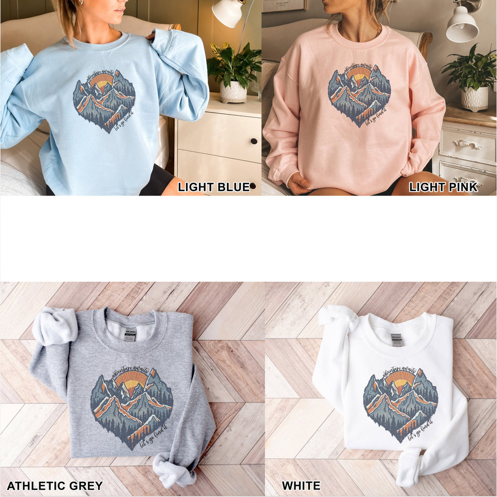 a woman wearing a sweatshirt with mountains on it