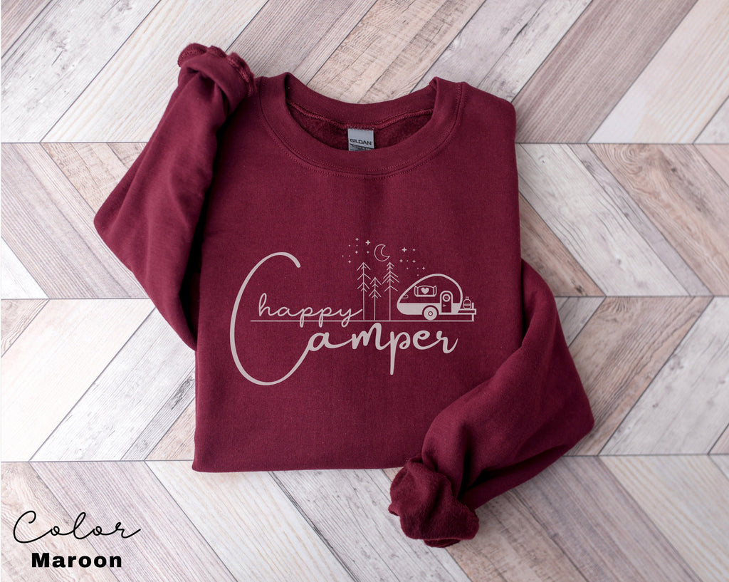 a red sweatshirt with a camper on it