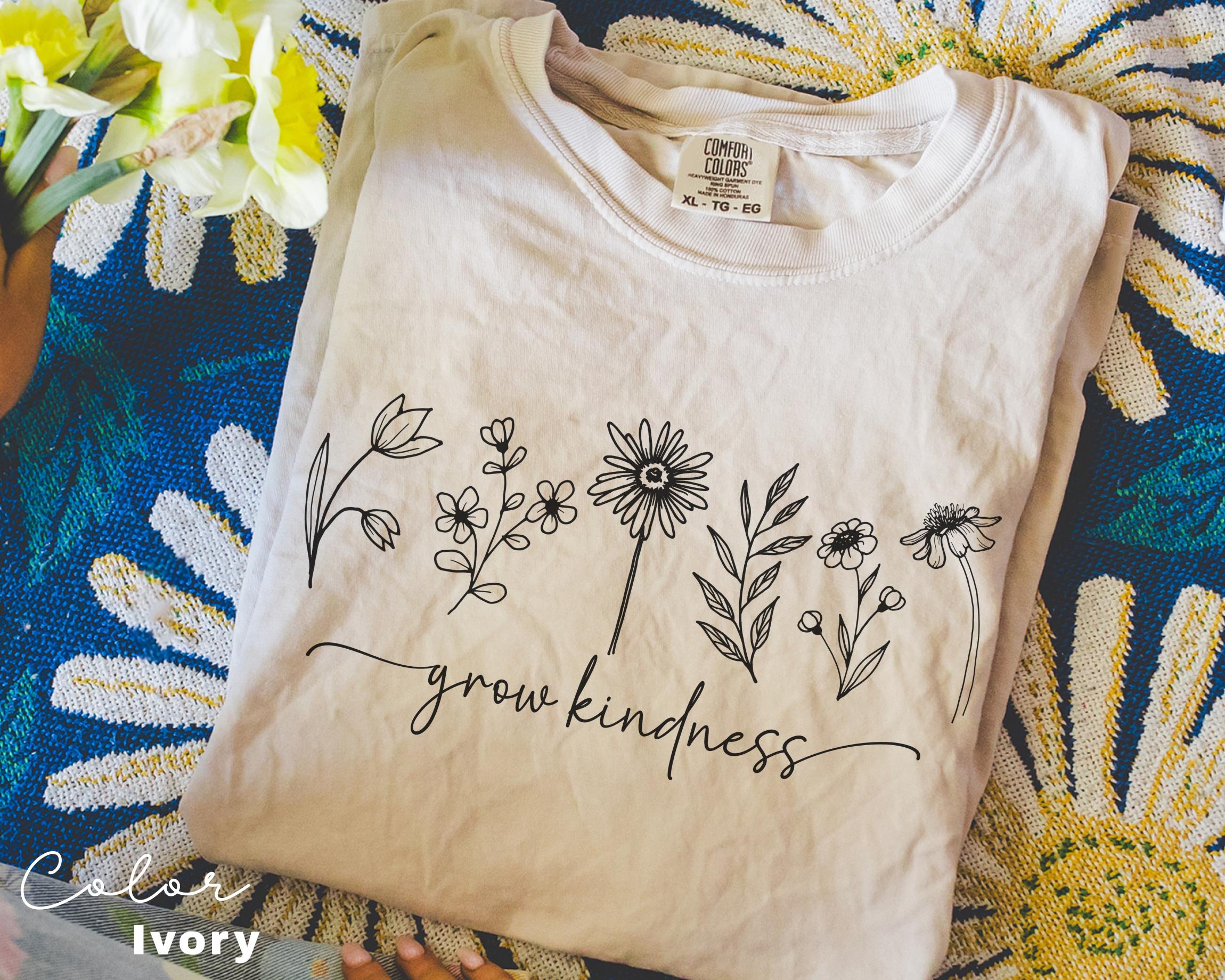 a t - shirt that says grow kindness on it