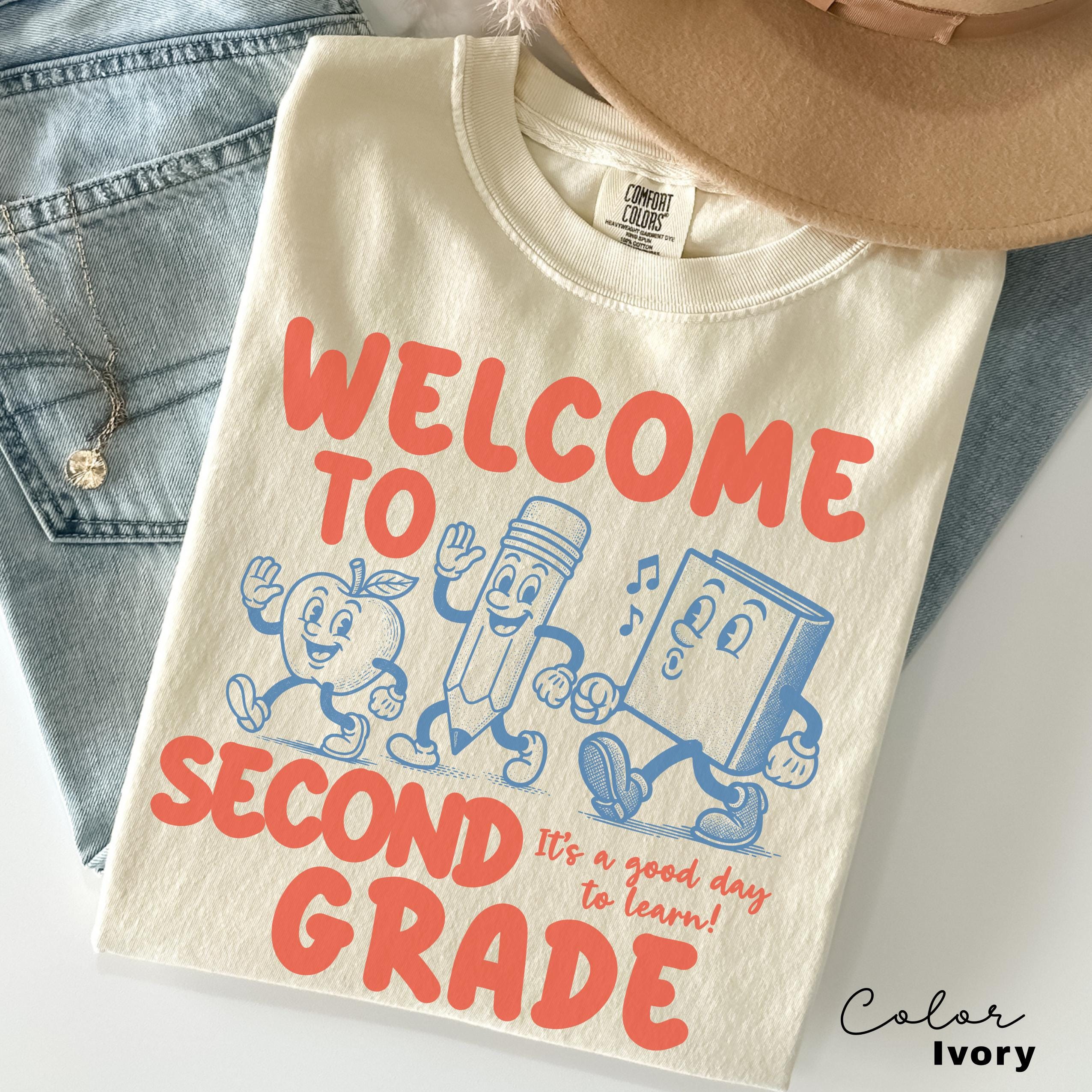a t - shirt that says welcome to second grade