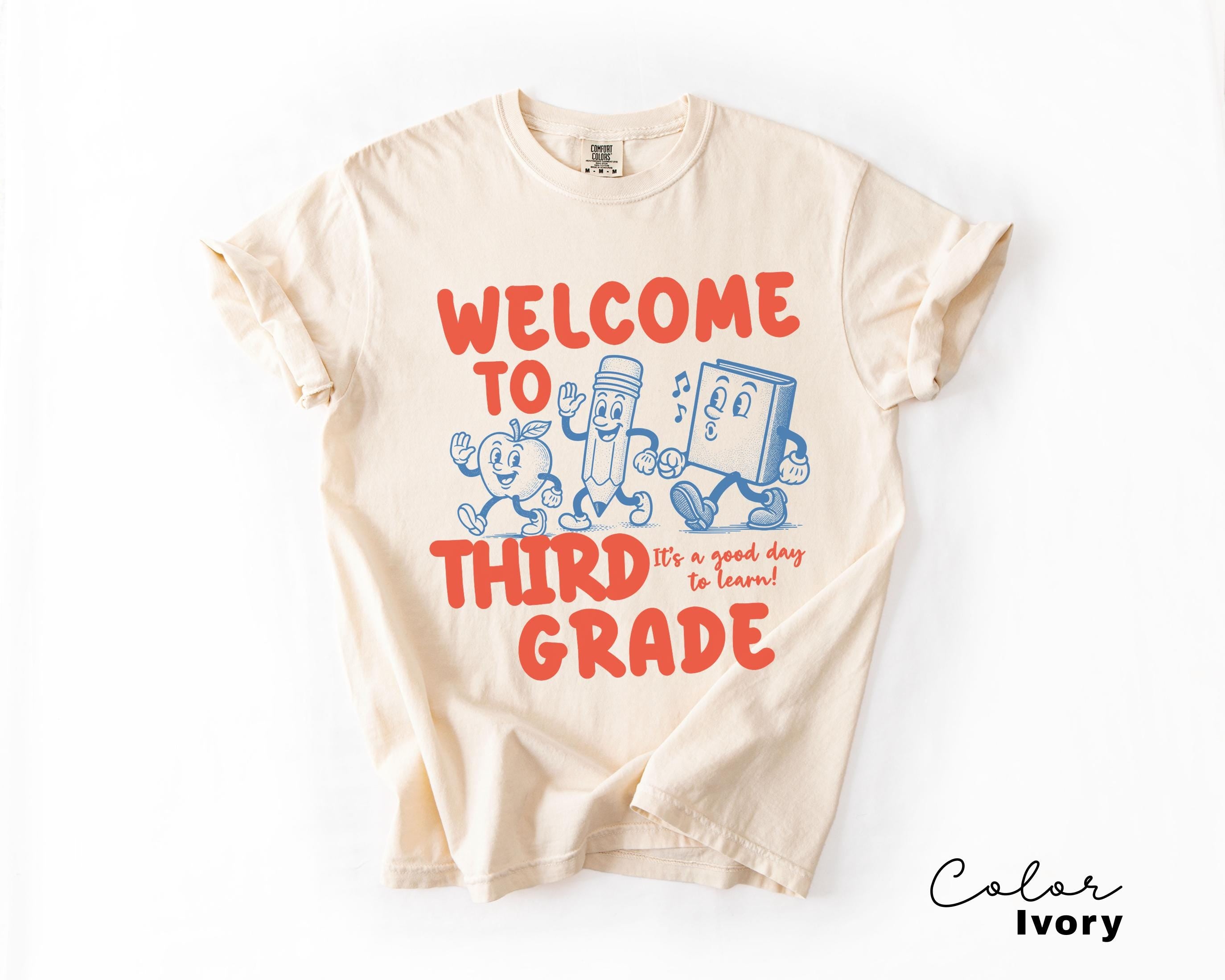 a t - shirt that says, welcome to third grade