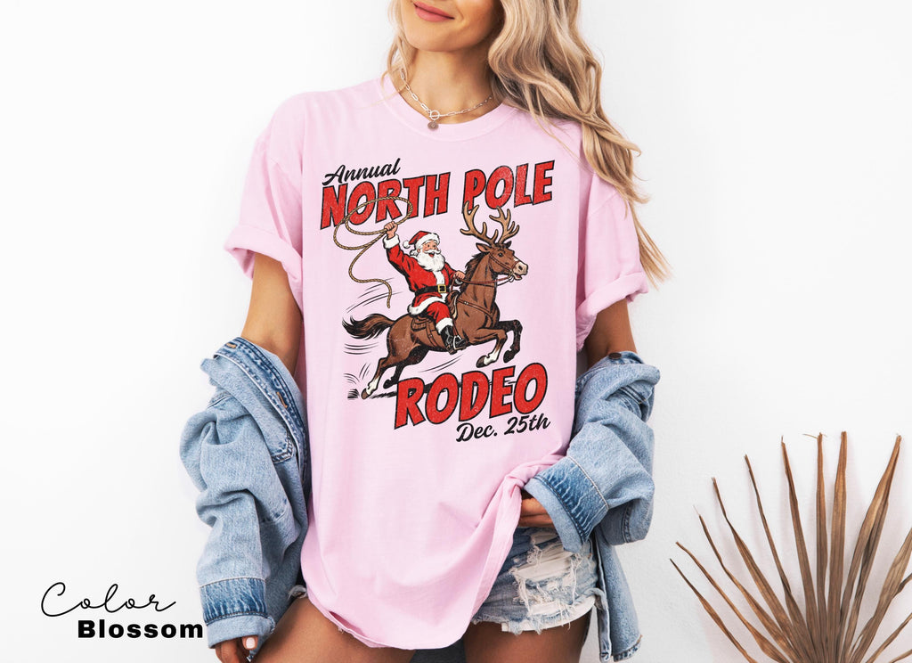 Retro Christmas North Pole Rodeo Shirt, Cowboy Santa Western Roping Christmas Shirt, Howdy Christmas T-shirt, Cowgirl Gift Wrangling Santa