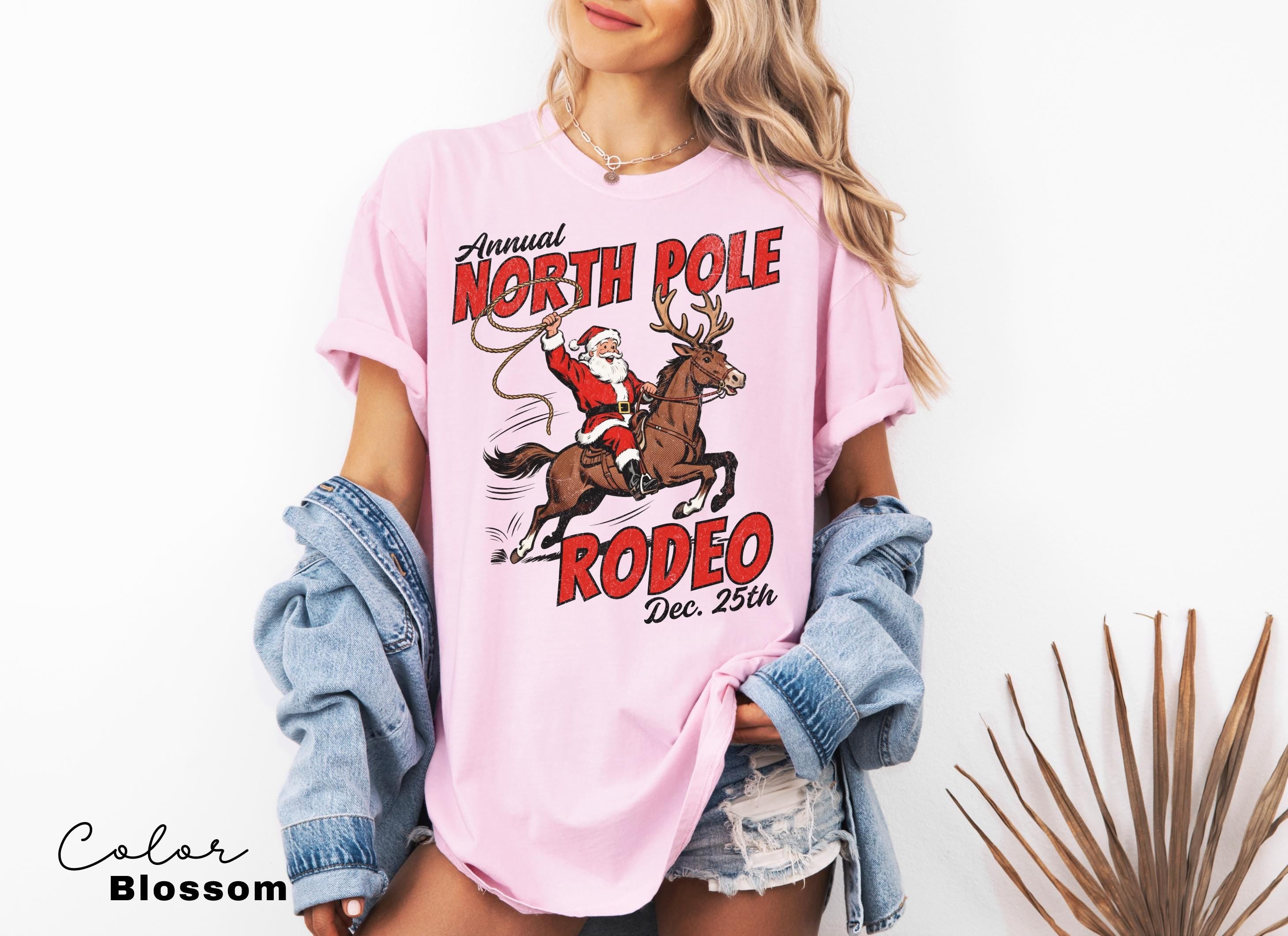 Retro Christmas North Pole Rodeo Shirt, Cowboy Santa Western Roping Christmas Shirt, Howdy Christmas T-shirt, Cowgirl Gift Wrangling Santa