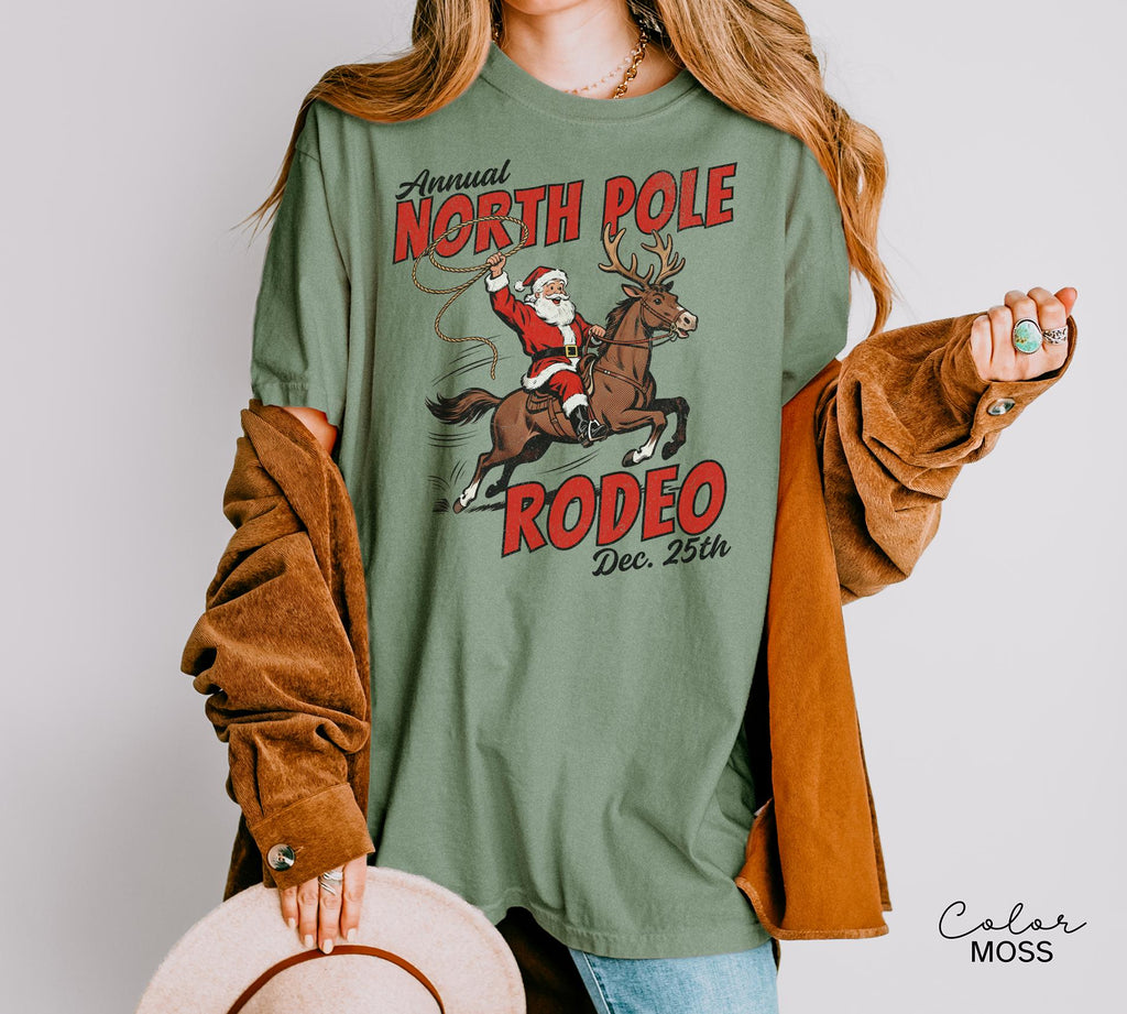 Retro Christmas North Pole Rodeo Shirt, Cowboy Santa Western Roping Christmas Shirt, Howdy Christmas T-shirt, Cowgirl Gift Wrangling Santa