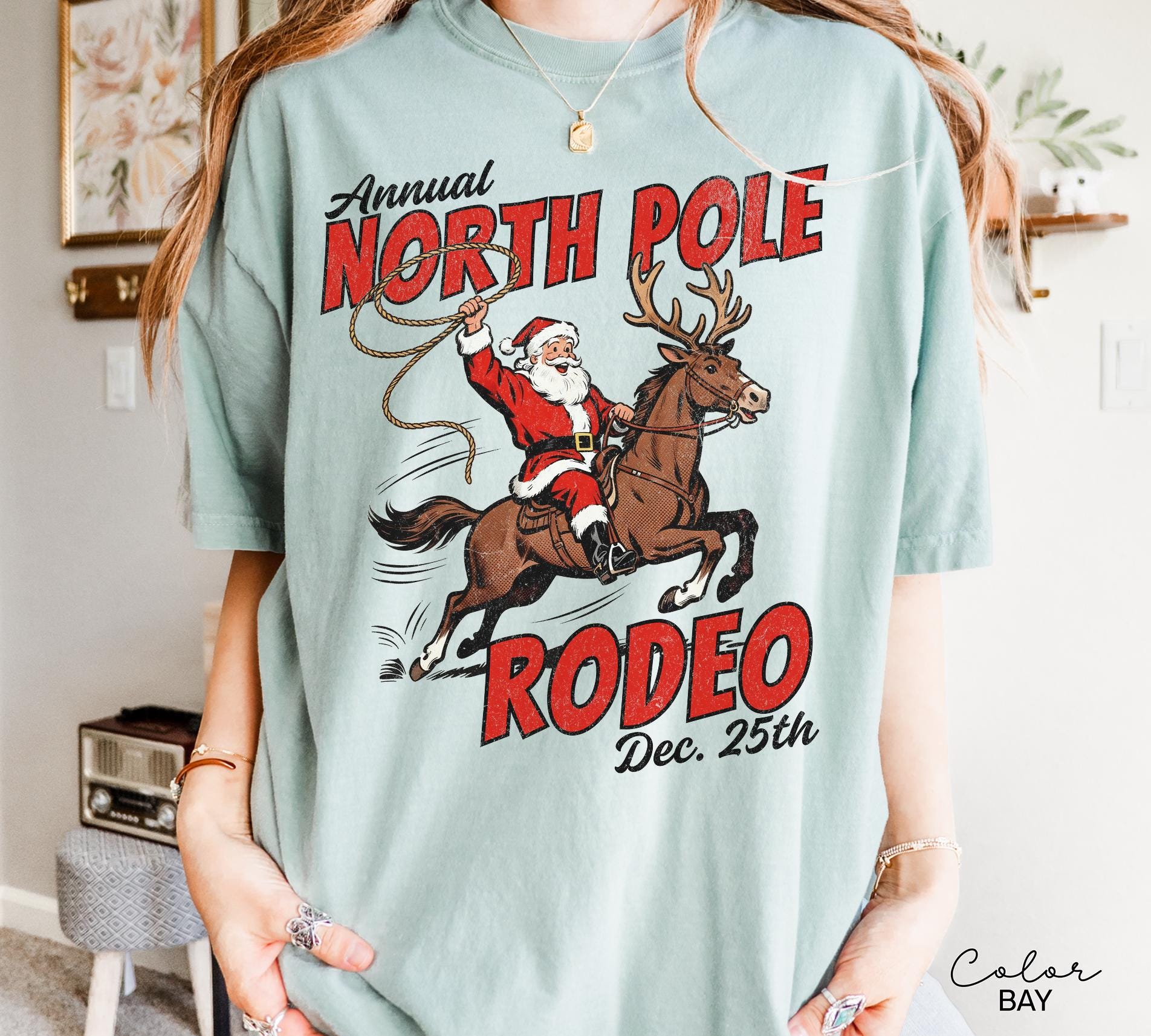 Retro Christmas North Pole Rodeo Shirt, Cowboy Santa Western Roping Christmas Shirt, Howdy Christmas T-shirt, Cowgirl Gift Wrangling Santa