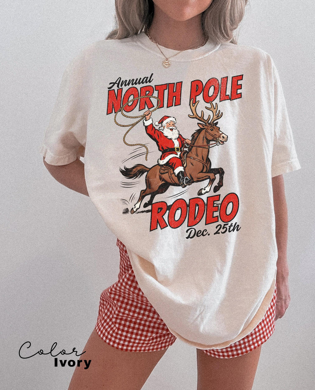Retro Christmas North Pole Rodeo Shirt, Cowboy Santa Western Roping Christmas Shirt, Howdy Christmas T-shirt, Cowgirl Gift Wrangling Santa
