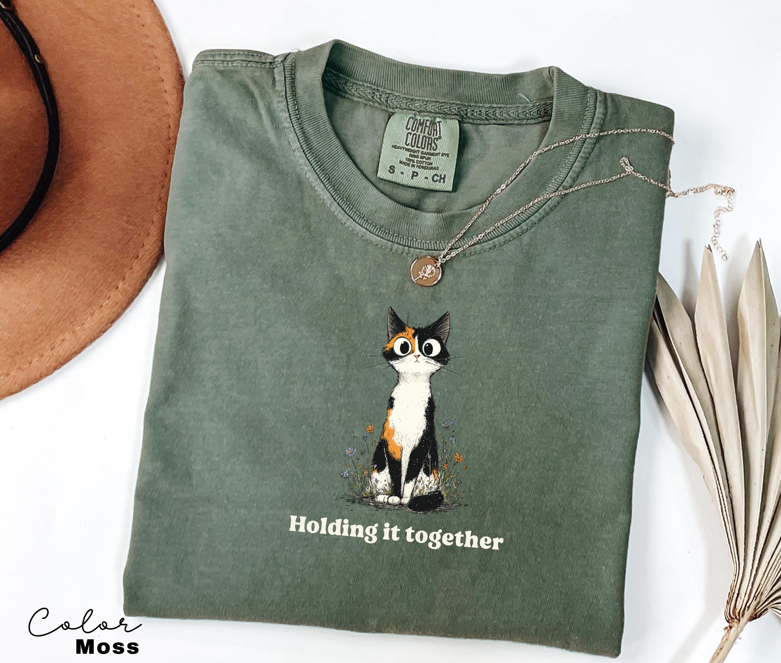 Holding it Together Cat Shirt, Comfort Colors, Funny Humor Shirt, Sarcasm, Unhinged Meme Shirt, Weird Dark Humor Shirt, Sarcastic Tshirt